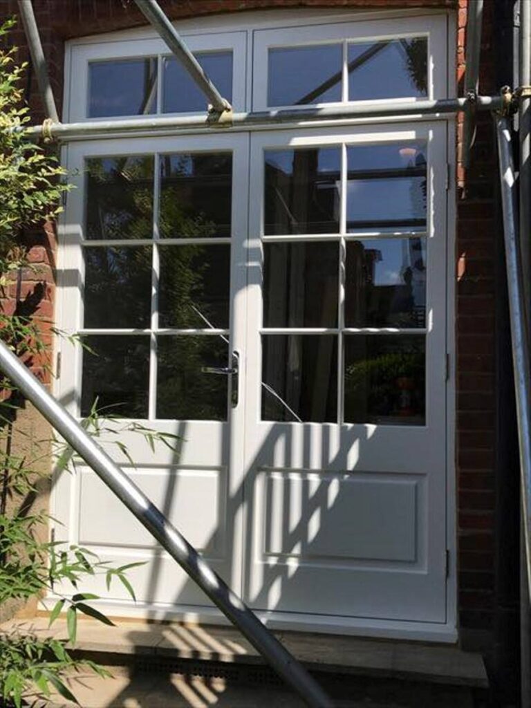 15 – residential conservation timber French doors with fan lights