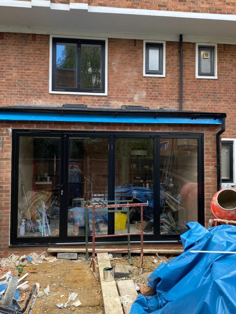 47 – residential conservation timber casement windows and aluminium bifold doors